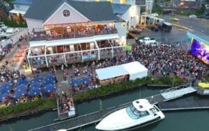 Photo of the back of Stony Creek Brewery with a party going on.