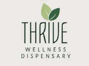 Thrive Wellness Dispensary logo with two green leaves, a tan background and dark green letters.