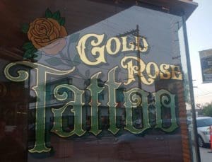 Gold Rose Tattoo